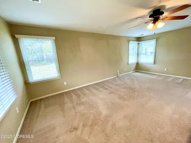5 Laurel Ave, Toms River, NJ 08753 - carpeted spare room with baseboards and ceiling fan