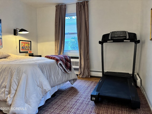 bedroom with wood finished floors