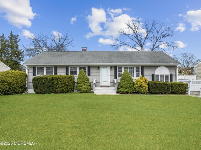 107 Arrowhead Park Dr, Brick, NJ 08724 - ranch-style home with a chimney, a shingled roof, a front yard, and fence