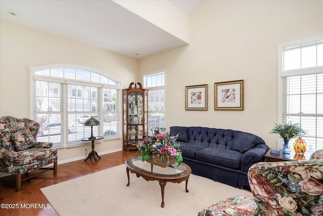 1306 Wickford Ln, Lanoka Harbor, NJ 08734 - living room with wood finished floors, baseboards, and a towering ceiling
