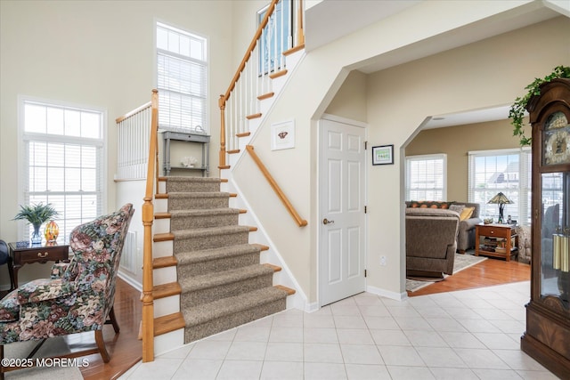 1306 Wickford Ln, Lanoka Harbor, NJ 08734 - stairs featuring a wealth of natural light, tile patterned flooring, and a high ceiling