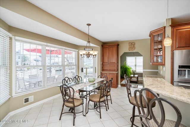 1306 Wickford Ln, Lanoka Harbor, NJ 08734 - dining space with a chandelier, light tile patterned flooring, baseboards, and visible vents