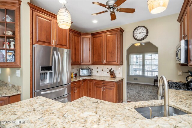 1306 Wickford Ln, Lanoka Harbor, NJ 08734 - kitchen with a sink, ceiling fan, light stone countertops, and stainless steel appliances