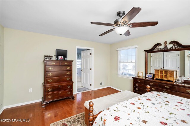 1306 Wickford Ln, Lanoka Harbor, NJ 08734 - bedroom with ceiling fan, baseboards, connected bathroom, and wood finished floors