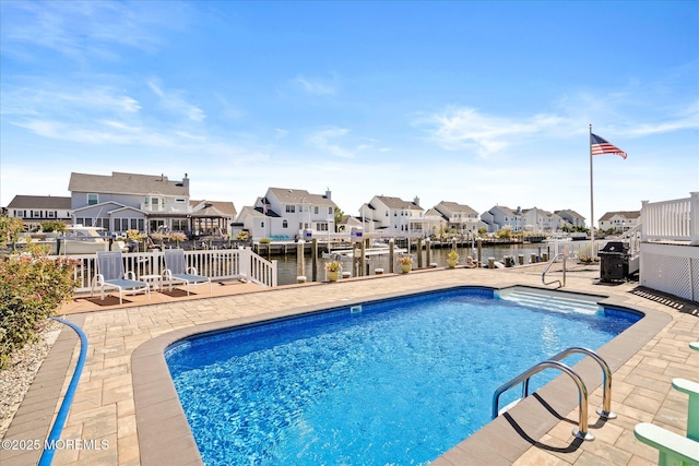 1306 Wickford Ln, Lanoka Harbor, NJ 08734 - view of swimming pool featuring a fenced in pool, a residential view, a patio, and a water view