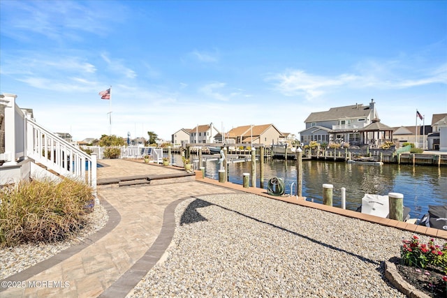 1306 Wickford Ln, Lanoka Harbor, NJ 08734 - view of dock featuring a water view, a residential view, and boat lift