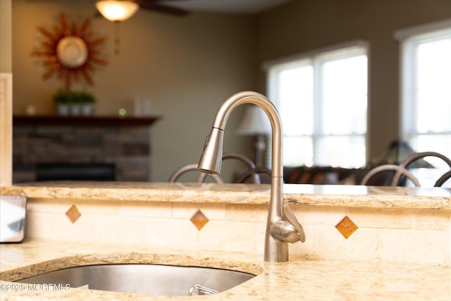 1306 Wickford Ln, Lanoka Harbor, NJ 08734 - details featuring ceiling fan and light stone countertops
