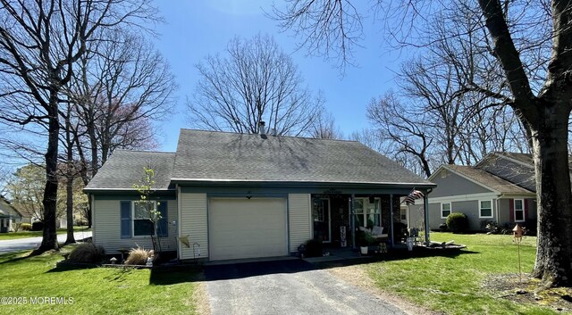 28 Morning Glory Ln, Whiting, NJ 08759 - ranch-style house with a porch, roof with shingles, a front lawn, an attached garage, and driveway