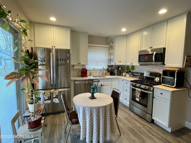 28 Morning Glory Ln, Whiting, NJ 08759 - kitchen featuring light wood-style flooring, white cabinetry, open shelves, and appliances with stainless steel finishes