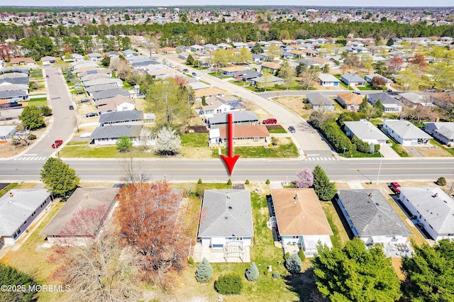 drone / aerial view with a residential view