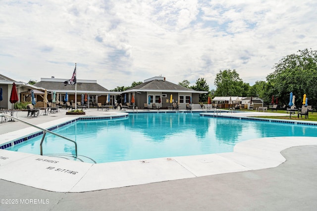 pool with a patio