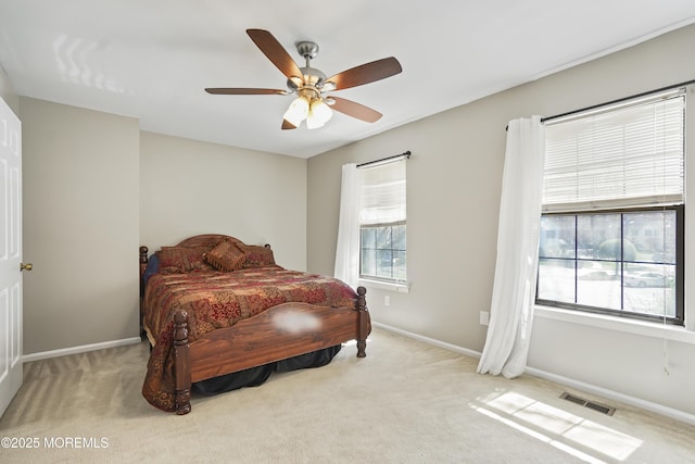 bedroom featuring visible vents, baseboards, and carpet floors