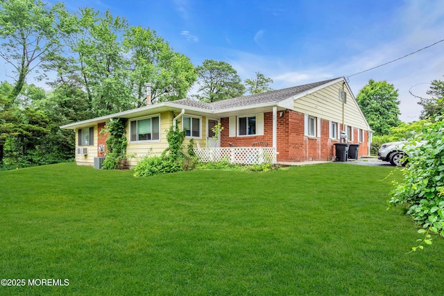 4 Flamingo Ter Unit A, Manchester, NJ 08759 - ranch-style house with a front lawn and brick siding
