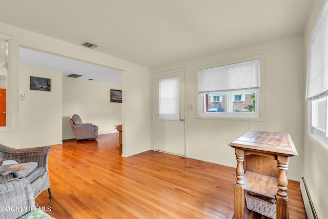 4 Flamingo Ter Unit A, Manchester, NJ 08759 - sitting room with a baseboard heating unit and light wood finished floors