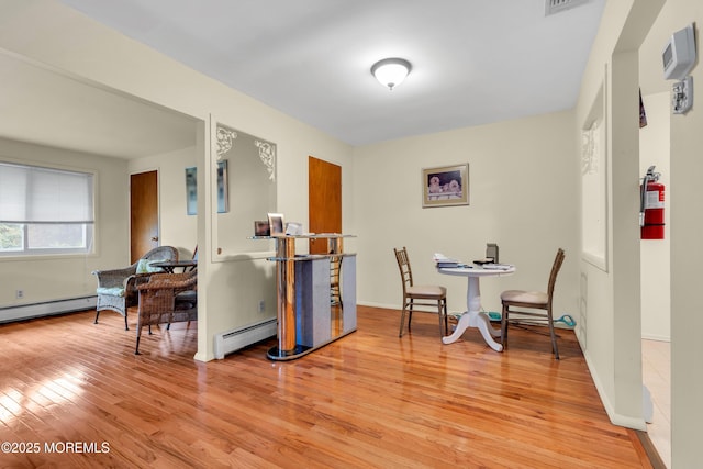 4 Flamingo Ter Unit A, Manchester, NJ 08759 - dining room with a baseboard heating unit and light wood-type flooring