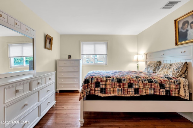 4 Flamingo Ter Unit A, Manchester, NJ 08759 - bedroom with multiple windows and dark wood-style flooring