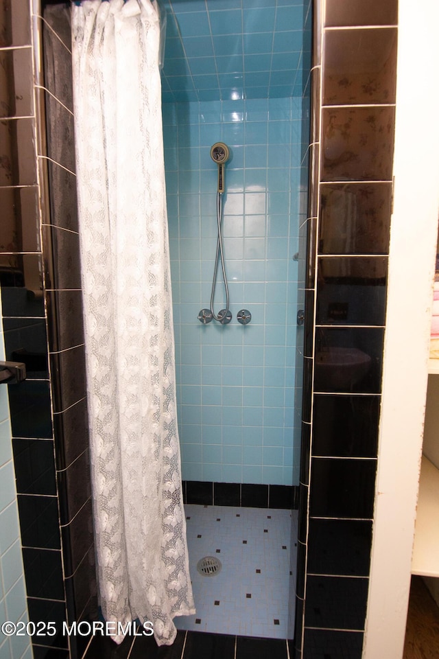 bathroom featuring a stall shower
