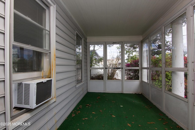 unfurnished sunroom with cooling unit