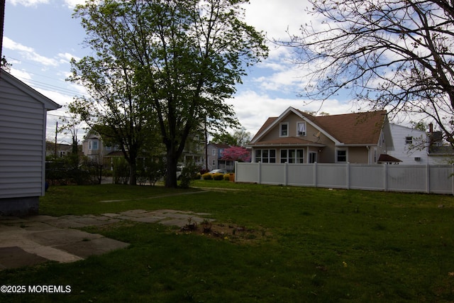 view of yard with fence