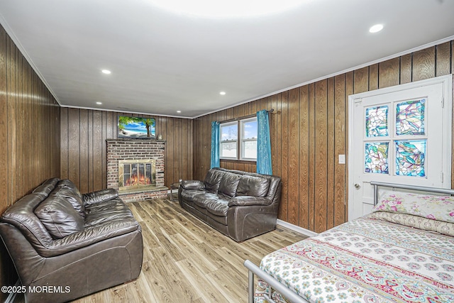 56 Dutch Rd, East Brunswick, NJ 08816 - living room featuring wood walls, a brick fireplace, recessed lighting, and wood finished floors