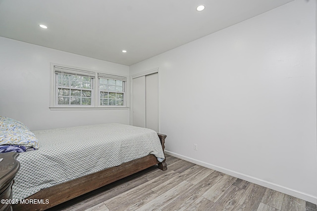 56 Dutch Rd, East Brunswick, NJ 08816 - bedroom featuring a closet, baseboards, light wood finished floors, and recessed lighting