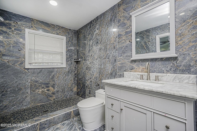 56 Dutch Rd, East Brunswick, NJ 08816 - bathroom with tiled shower, vanity, tile walls, and toilet
