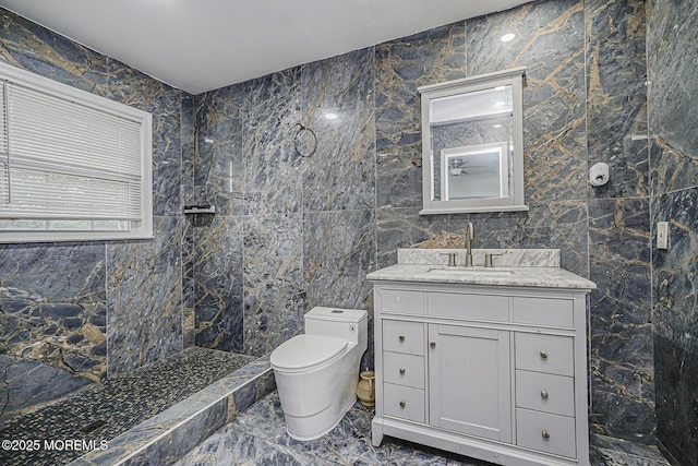 56 Dutch Rd, East Brunswick, NJ 08816 - bathroom featuring a walk in shower, vanity, toilet, marble finish floor, and tile walls