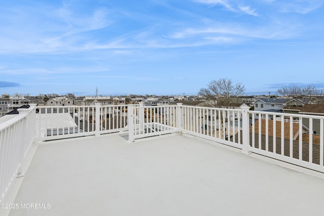 view of patio with a residential view and a deck