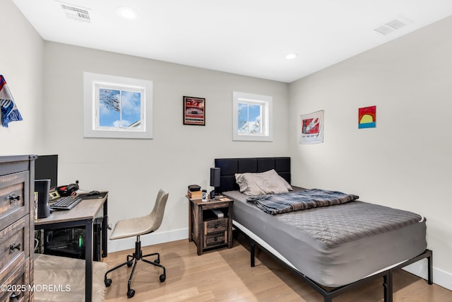 bedroom featuring baseboards, recessed lighting, visible vents, and light wood-type flooring