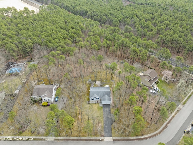 bird's eye view featuring a view of trees