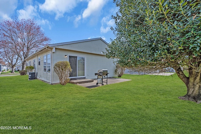 9 Banning Ct, Toms River, NJ 08757 - back of house featuring central AC, a lawn, and a patio area