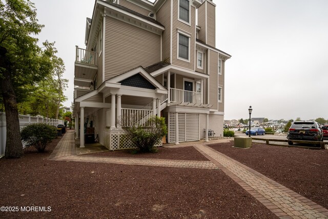 349 Harbor Vw, Forked River, NJ 08731 - view of front of house featuring stairway and a porch
