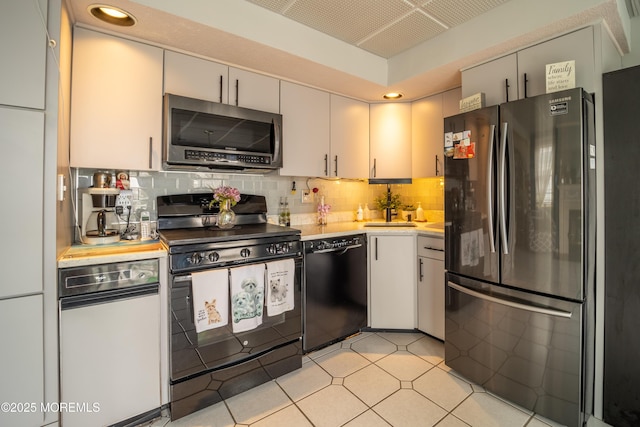 349 Harbor Vw, Forked River, NJ 08731 - kitchen featuring black appliances, light countertops, decorative backsplash, and recessed lighting