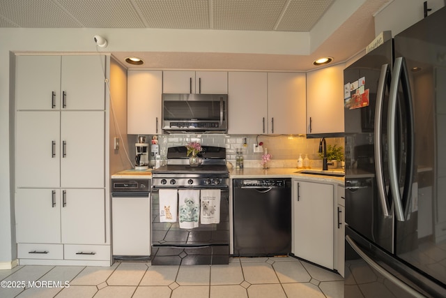 349 Harbor Vw, Forked River, NJ 08731 - kitchen featuring black appliances, light countertops, backsplash, and recessed lighting