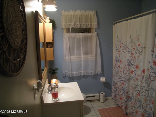full bath featuring baseboards, a shower with shower curtain, baseboard heating, vanity, and tile patterned flooring
