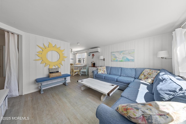 living room with a wall unit AC