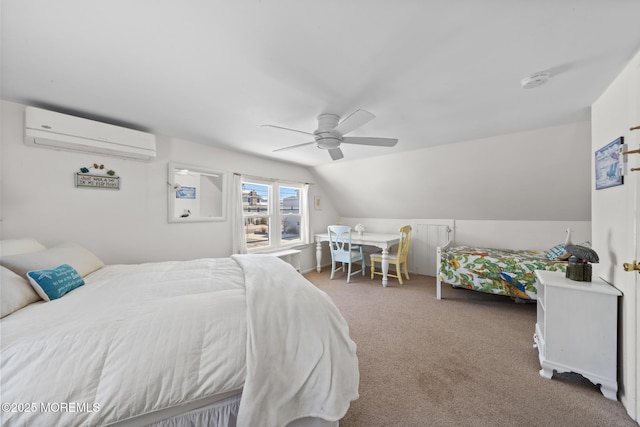 carpeted bedroom featuring a wall mounted AC, a ceiling fan, and vaulted ceiling