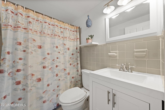bathroom featuring vanity, a shower with curtain, toilet, tile walls, and backsplash