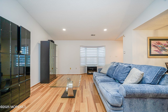 13 Gatley Close Unit 1000, Freehold, NJ 07728 - living room featuring visible vents, recessed lighting, and light wood-style floors