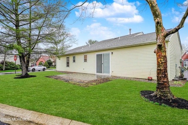 13 Gatley Close Unit 1000, Freehold, NJ 07728 - rear view of property with a patio and a yard