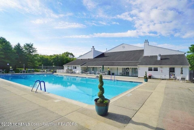 13 Gatley Close Unit 1000, Freehold, NJ 07728 - pool with fence and a patio