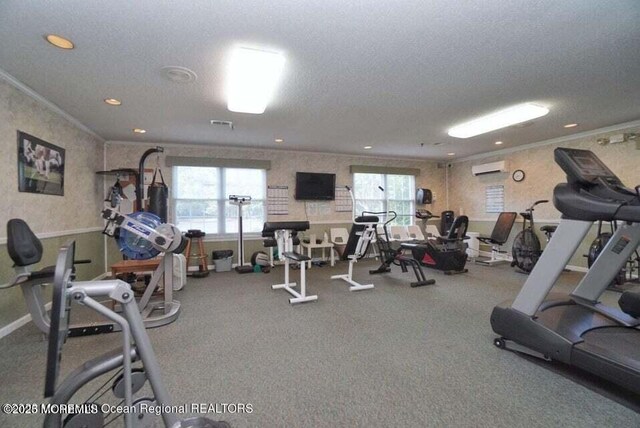 13 Gatley Close Unit 1000, Freehold, NJ 07728 - exercise room featuring crown molding, a wall unit AC, and recessed lighting