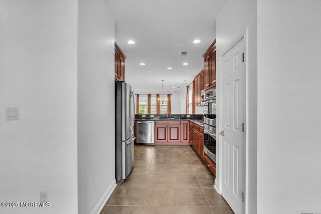 3 Marlborough Ct, Jackson, NJ 08527 - kitchen featuring recessed lighting, dark countertops, visible vents, stainless steel appliances, and a sink