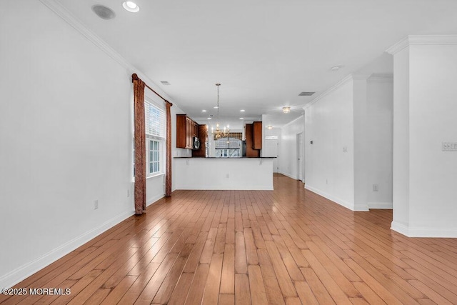 3 Marlborough Ct, Jackson, NJ 08527 - unfurnished living room featuring visible vents, baseboards, an inviting chandelier, crown molding, and light wood-style flooring