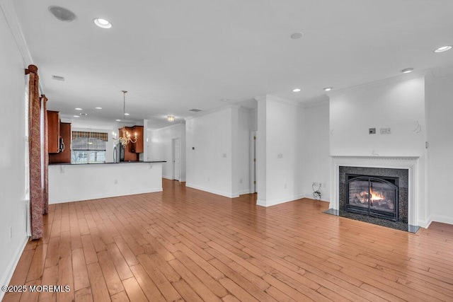 3 Marlborough Ct, Jackson, NJ 08527 - unfurnished living room with recessed lighting, a fireplace, and light wood-style floors