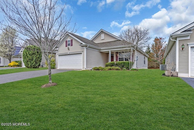 3 Marlborough Ct, Jackson, NJ 08527 - view of front of home featuring aphalt driveway, an attached garage, central AC, and a front lawn