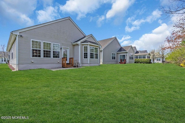 3 Marlborough Ct, Jackson, NJ 08527 - rear view of property featuring a lawn