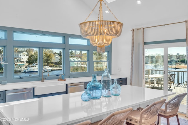 1417 Holmes Ave, Toms River, NJ 08753 - dining area with a chandelier, vaulted ceiling, and recessed lighting