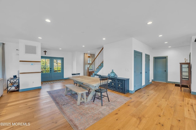 1417 Holmes Ave, Toms River, NJ 08753 - dining area with light wood-style floors, stairway, recessed lighting, and baseboards