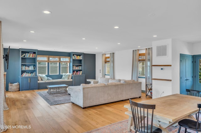 1417 Holmes Ave, Toms River, NJ 08753 - living room featuring recessed lighting, light wood-type flooring, and built in shelves